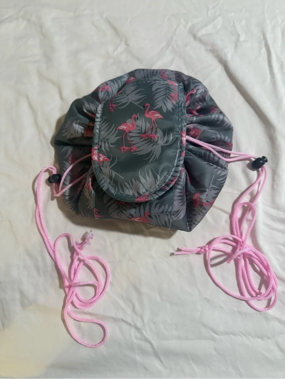 Flamingo Print Magic Drawstring Makeup Bag Grey Pink Flat Lay Cosmetic Pouch